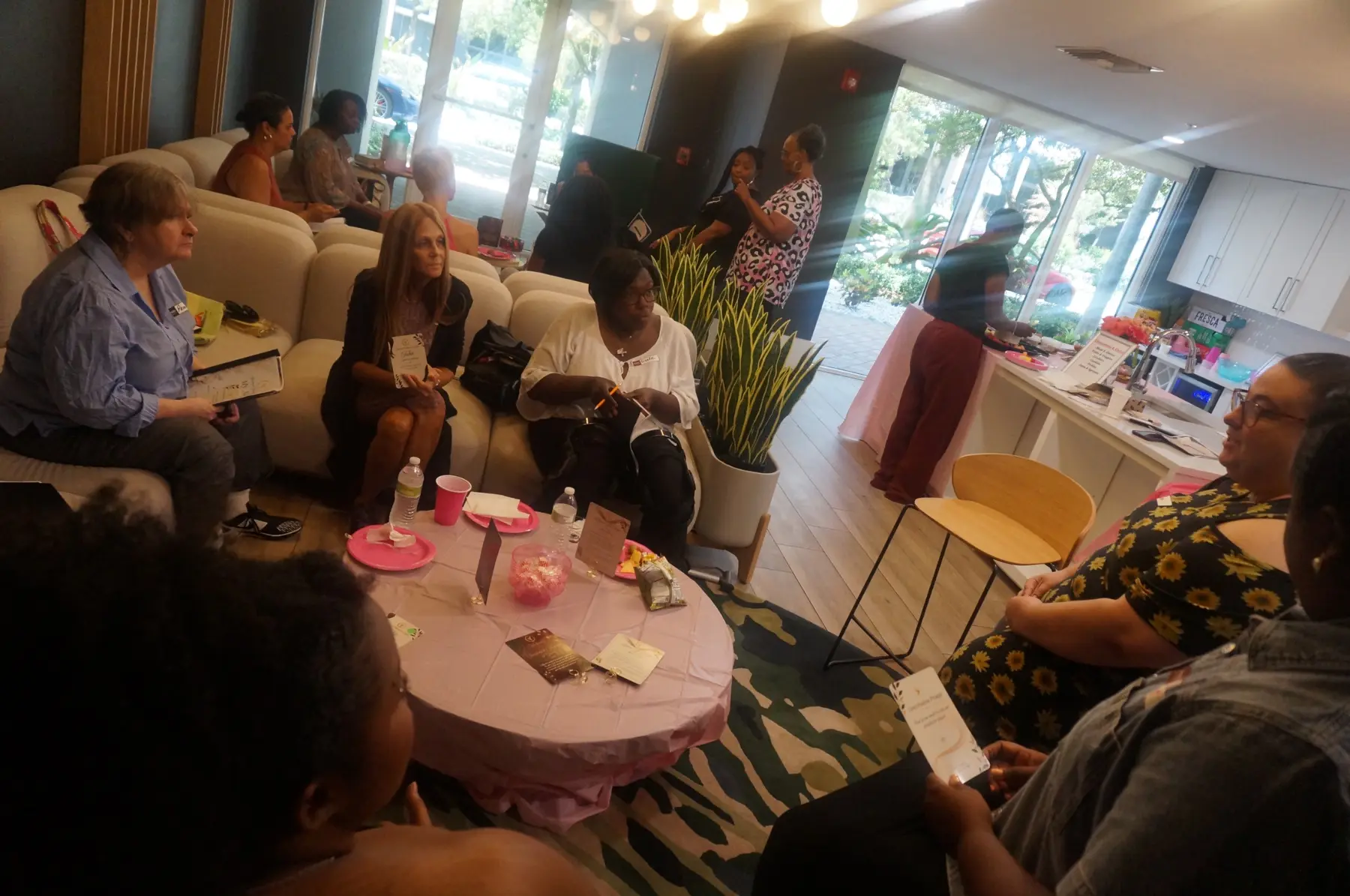 Women participating in a guided conversation circle