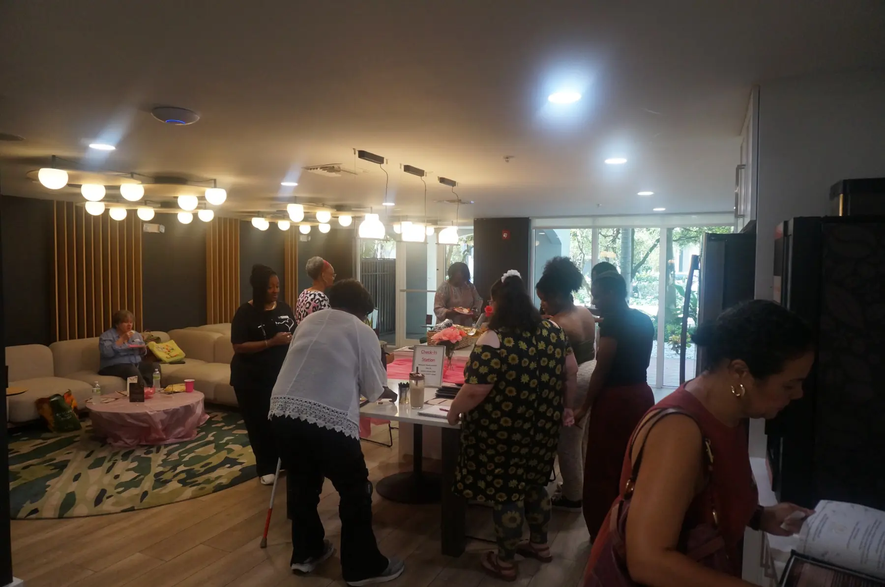 Women arriving and greeting one another