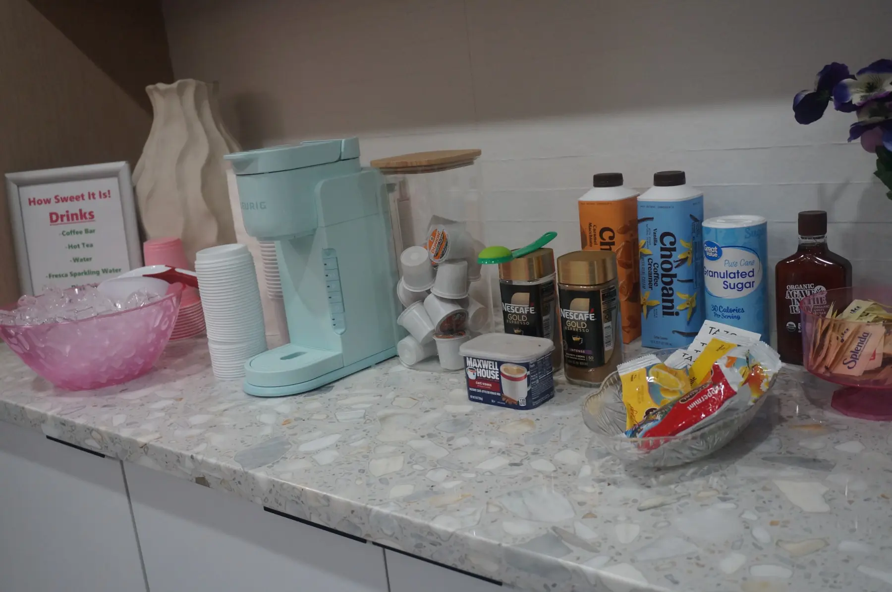 Coffee, tea, sweeteners, and cups prepared for the women