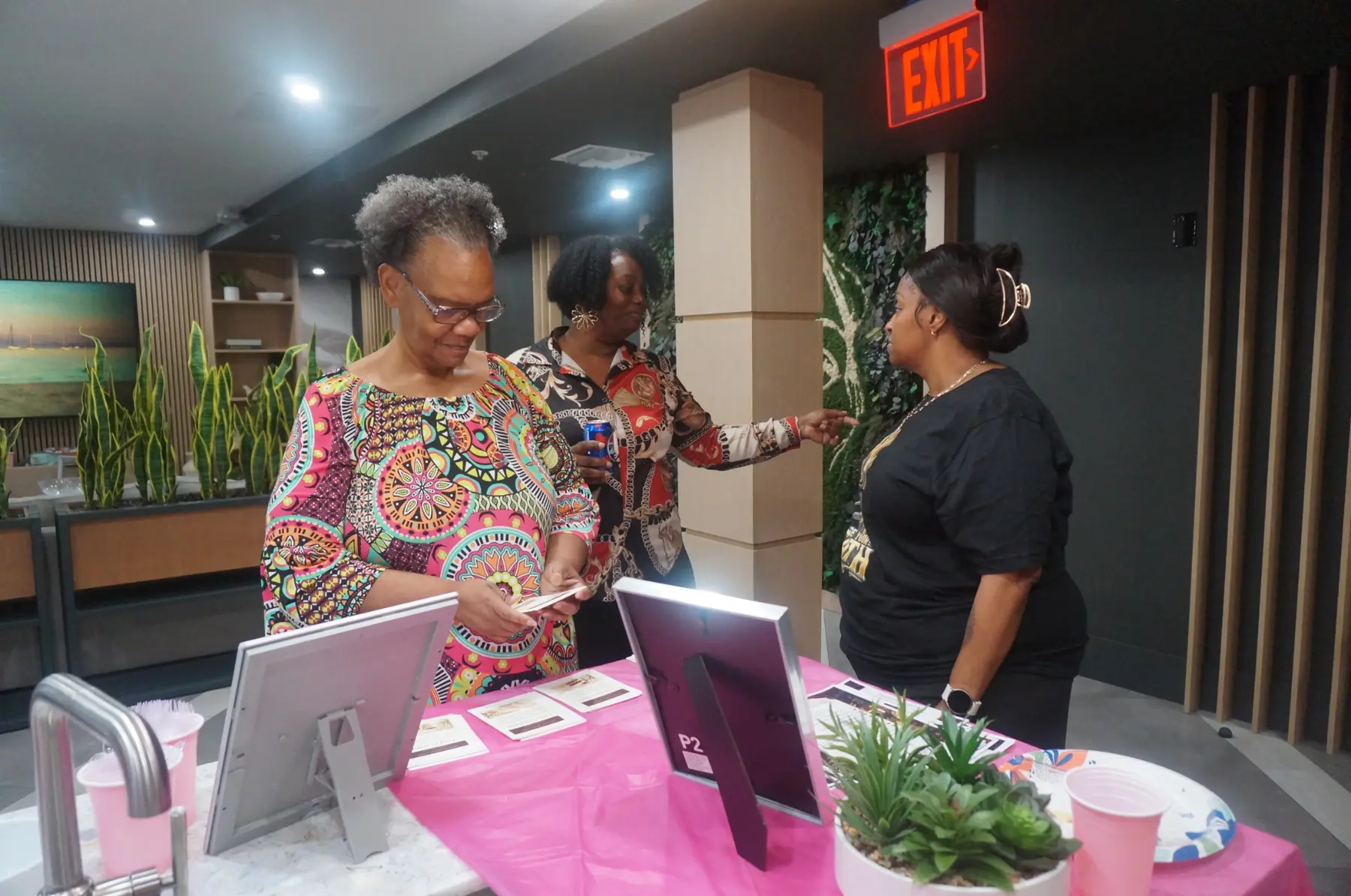 Women gathering and preparing for the closing activities