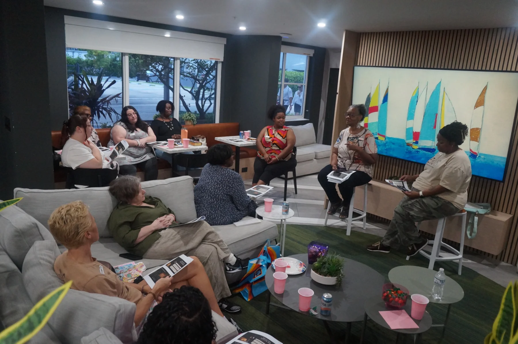 Women listening to a speaker during the gathering