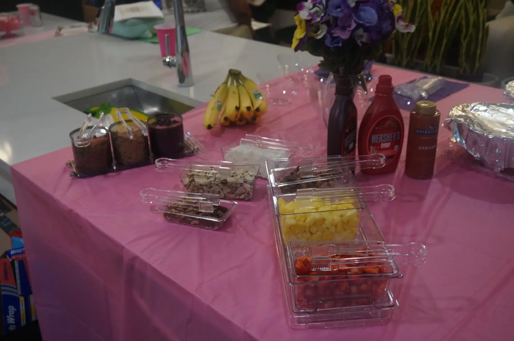 Sorbet sauces, fruit, and toppings arranged for the Taste and See gathering