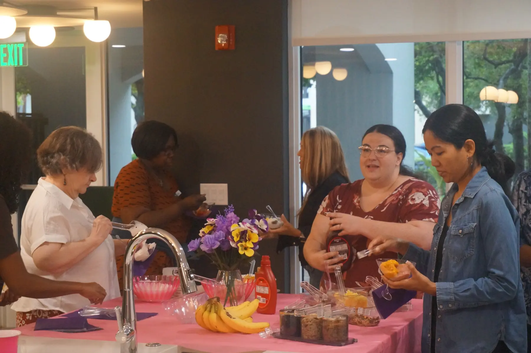 Women enjoying conversation while preparing their sorbet
