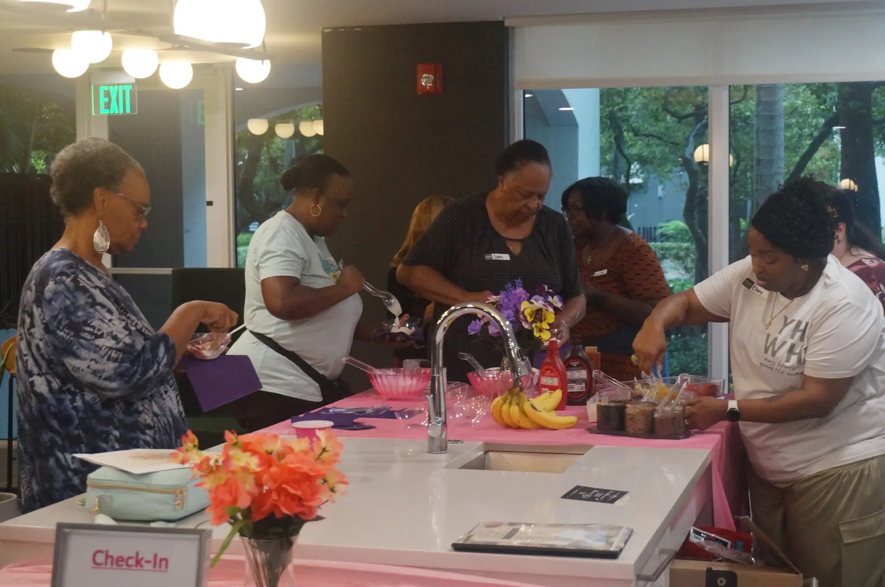 Women gathered near the welcome and sorbet tables