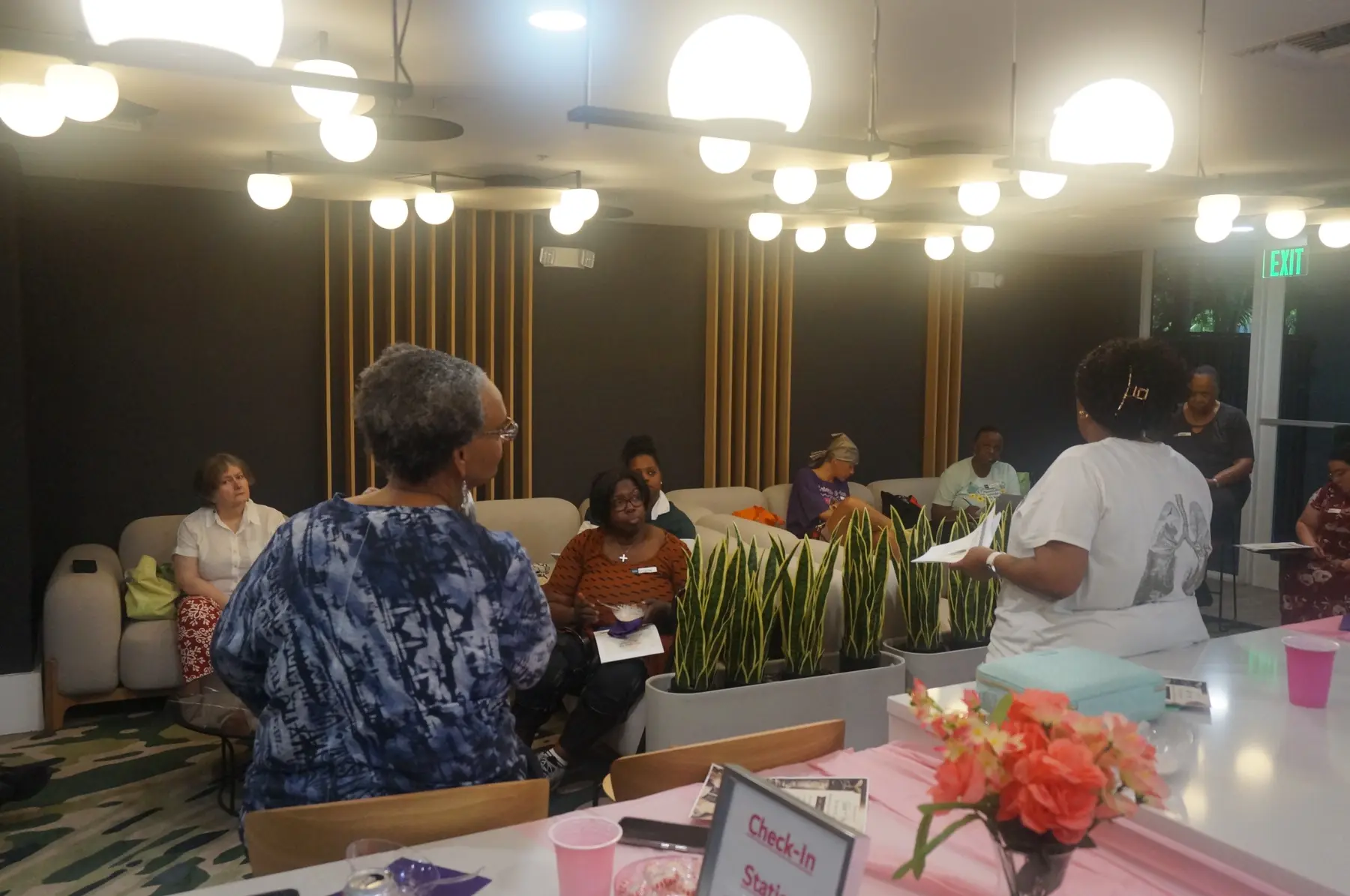 Women gathered as the teaching begins