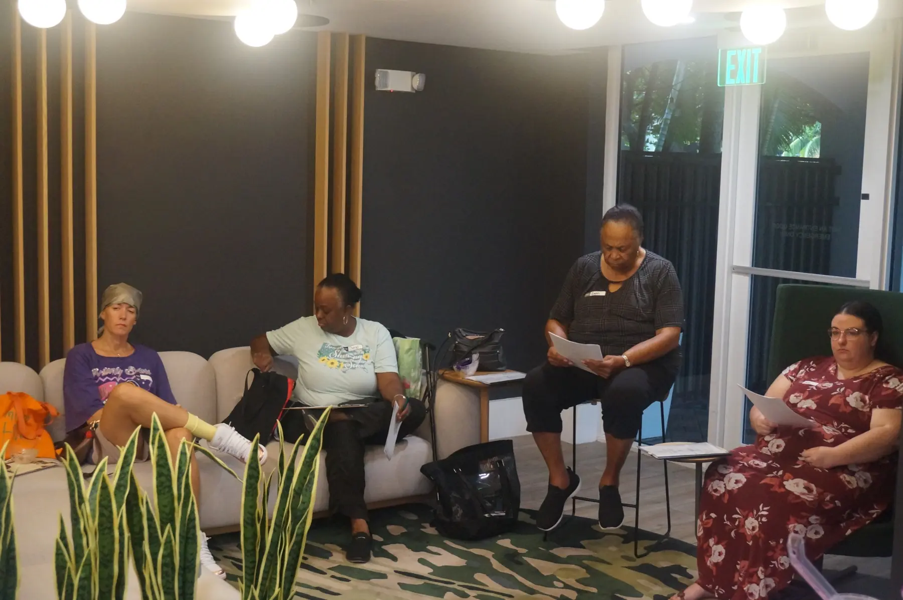 Women seated together during the lesson