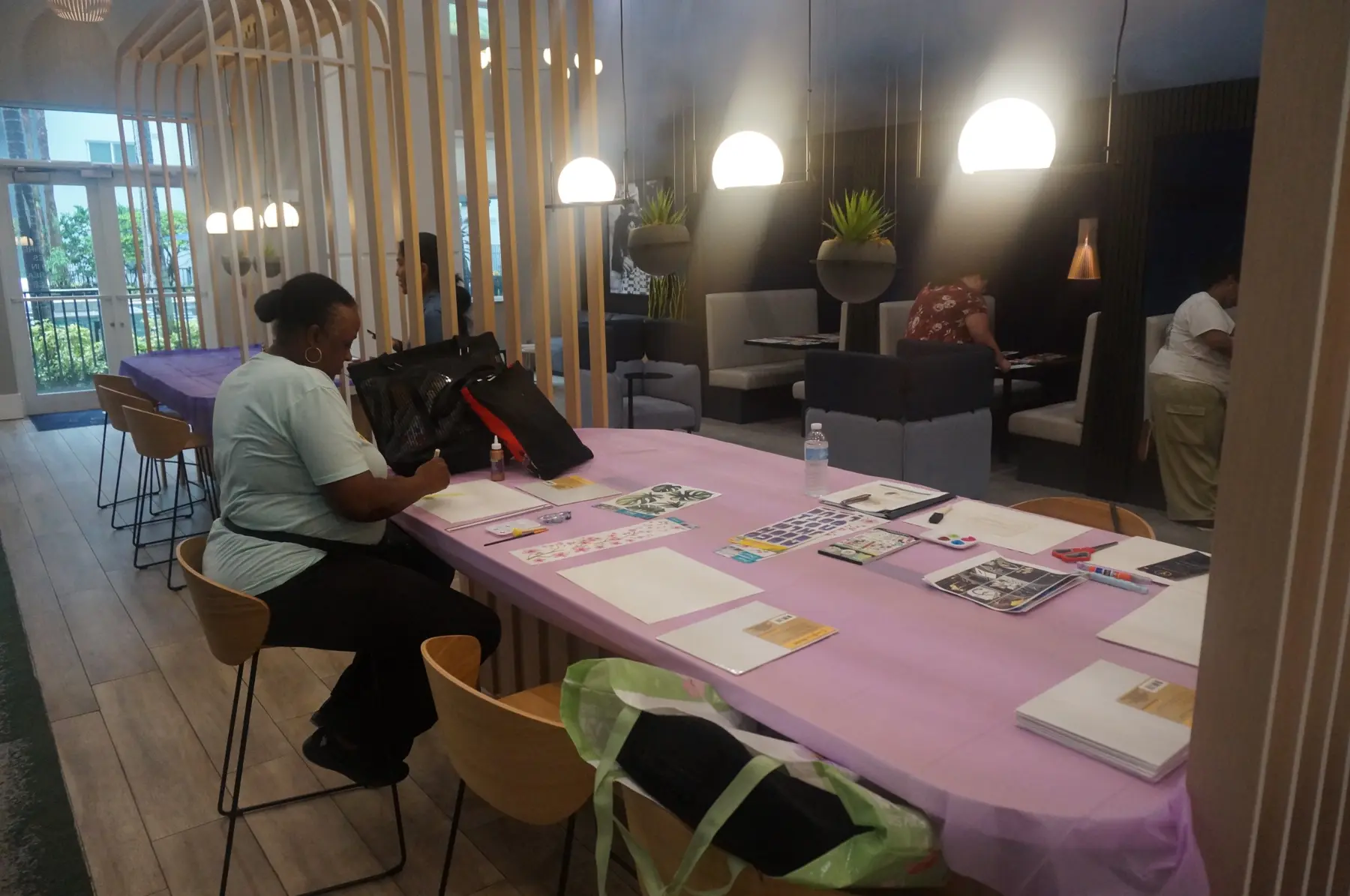 A woman beginning her personal mini-vision board